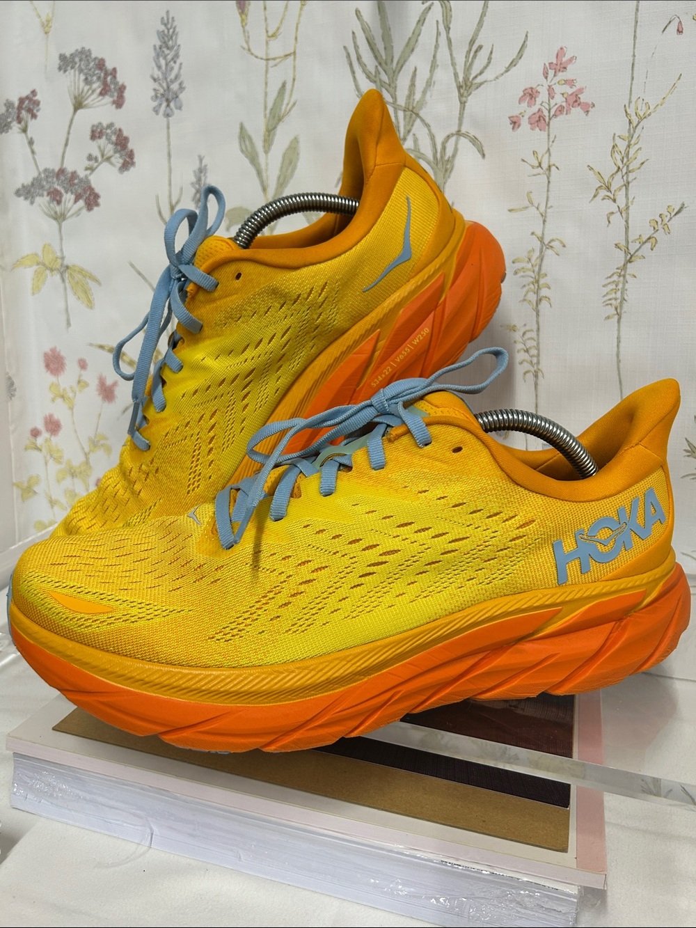Hoka Men’s Clifton 8 Yellow and Orange Athletic Running Shoes with Blue Accents